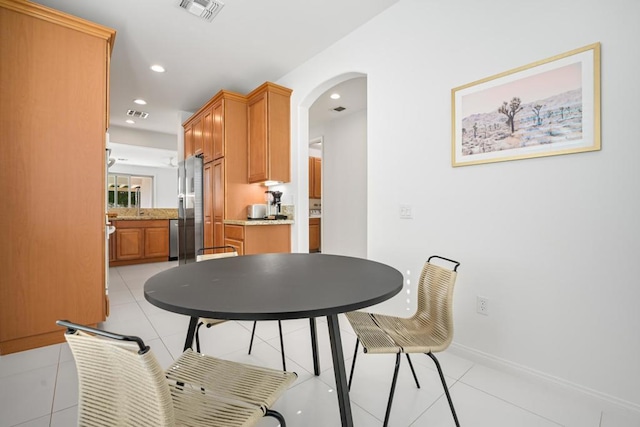 view of tiled dining space