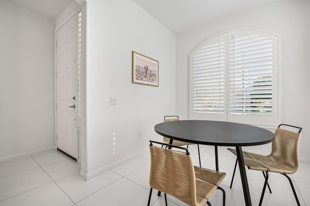 dining room with light tile patterned floors