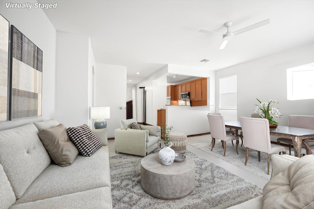 living room with ceiling fan