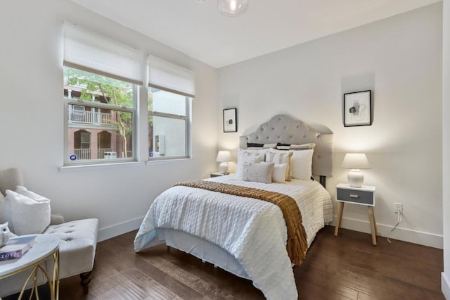 bedroom featuring dark hardwood / wood-style floors