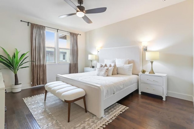 bedroom featuring ceiling fan and dark hardwood / wood-style flooring