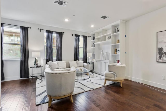 living room with dark hardwood / wood-style floors