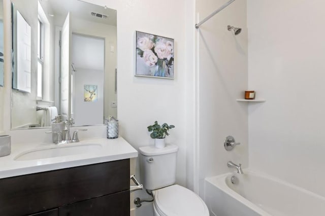 full bathroom with toilet,  shower combination, and vanity