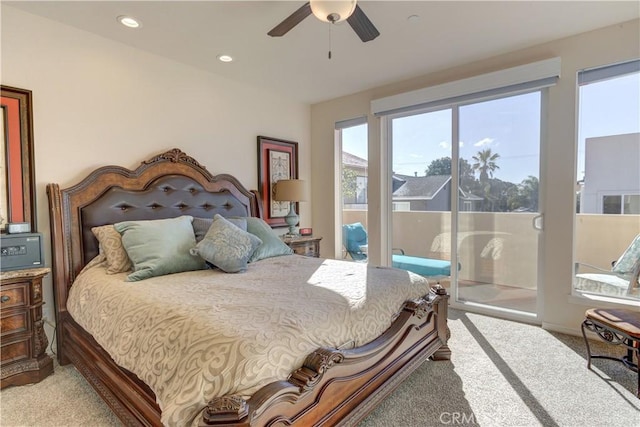 bedroom featuring ceiling fan and light carpet