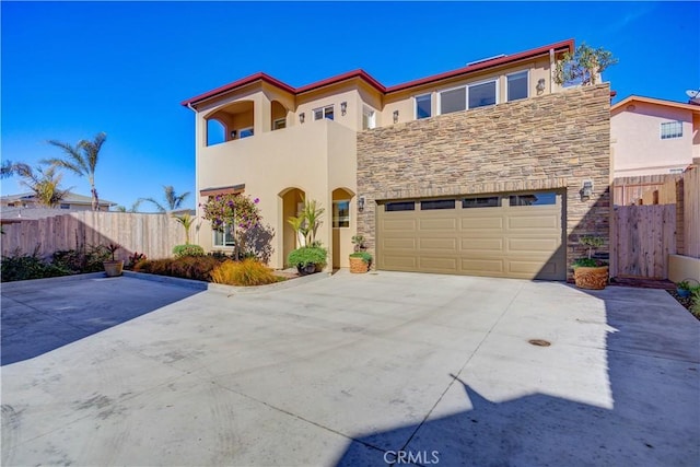 view of front of property with a garage