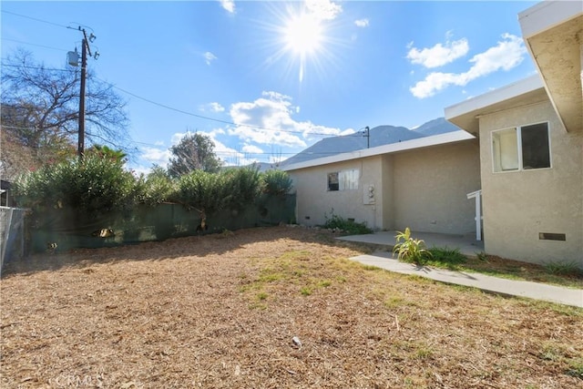 view of yard with a patio area and fence