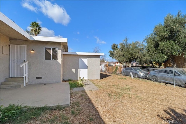 view of yard featuring a patio and fence