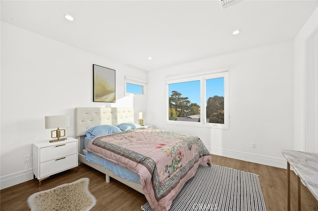 bedroom featuring dark hardwood / wood-style floors