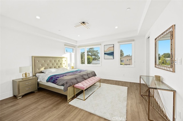 bedroom featuring light hardwood / wood-style floors