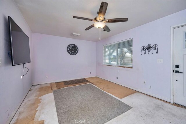 spare room with ceiling fan