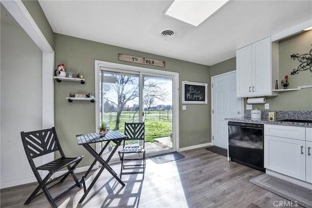 18078 Spyglass Rd, Hidden Valley Lake, CA 95467 - kitchen with open shelves, white cabinets, baseboards, light wood finished floors, and black dishwasher