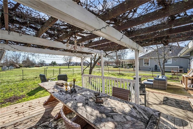 wooden terrace with a lawn, an outdoor hangout area, and a rural view