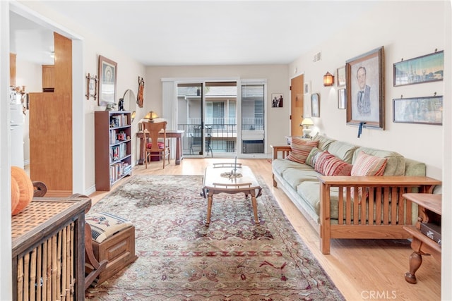 living room with light hardwood / wood-style floors