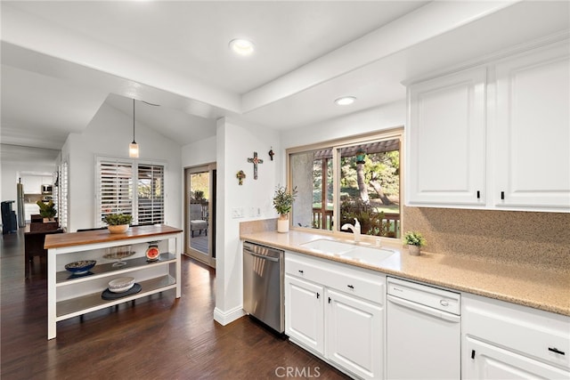 kitchen with decorative light fixtures, sink, white cabinets, and dishwasher