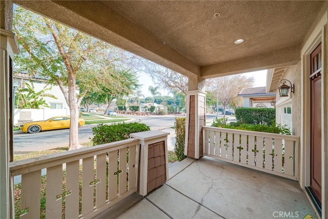 balcony featuring a porch