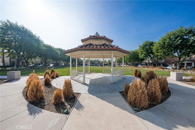 view of home's community featuring a lawn and a gazebo