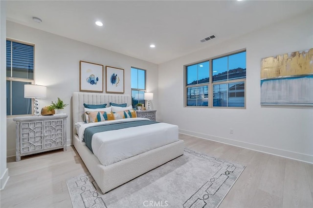 bedroom with hardwood / wood-style flooring