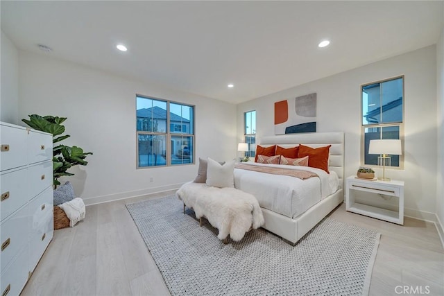 bedroom with light hardwood / wood-style flooring