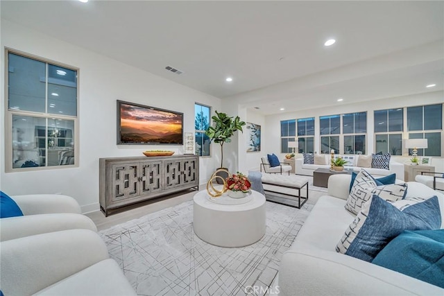 living room with light hardwood / wood-style flooring