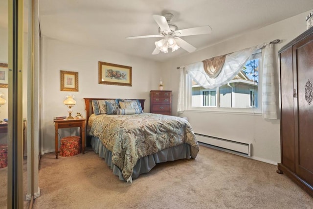 bedroom with ceiling fan, light colored carpet, and a baseboard heating unit