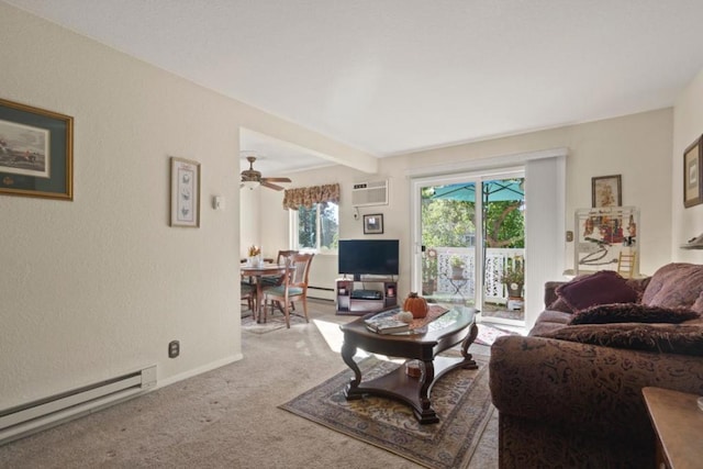 living room featuring baseboard heating, carpet, and an AC wall unit