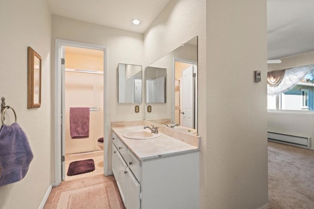 bathroom with walk in shower, a baseboard radiator, vanity, and toilet