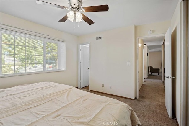 carpeted bedroom featuring ceiling fan