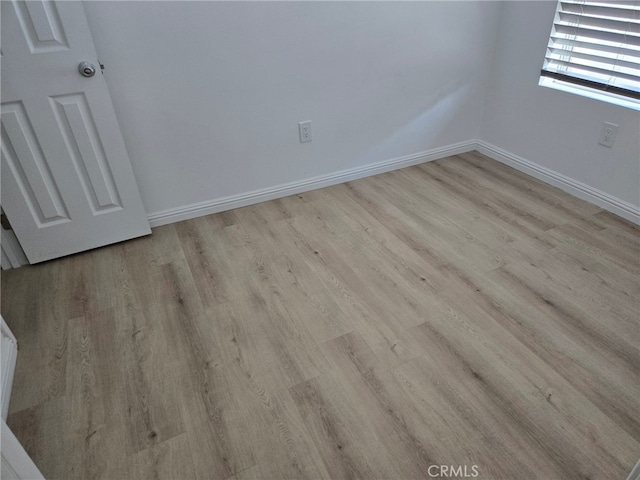 empty room featuring light hardwood / wood-style flooring