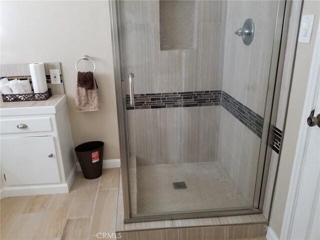 bathroom featuring an enclosed shower