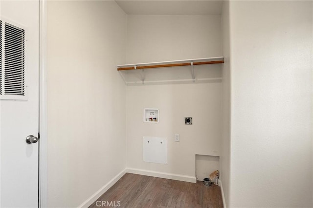 laundry room with dark wood-type flooring, washer hookup, and electric dryer hookup