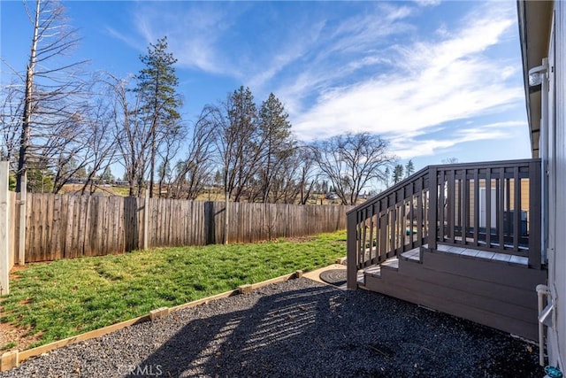 view of yard with a wooden deck