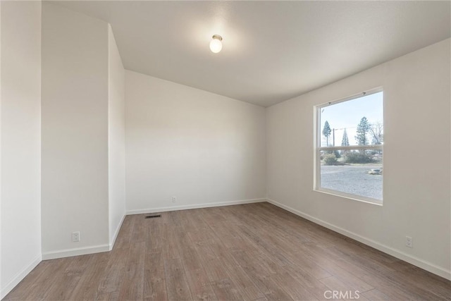 empty room featuring light hardwood / wood-style floors