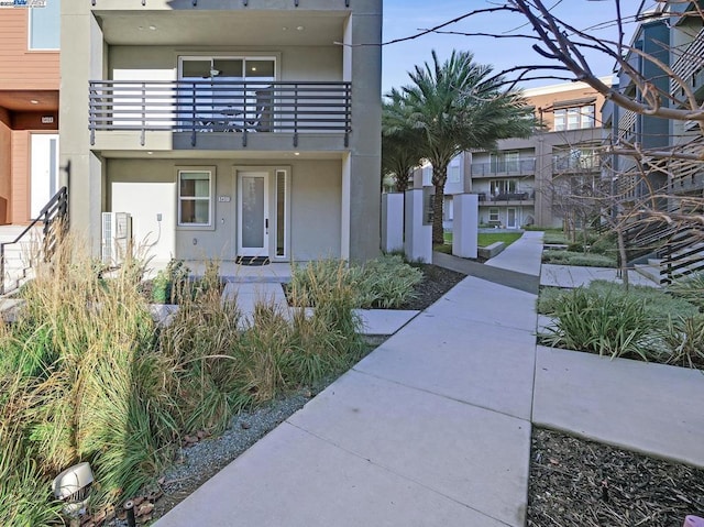 property entrance with a balcony