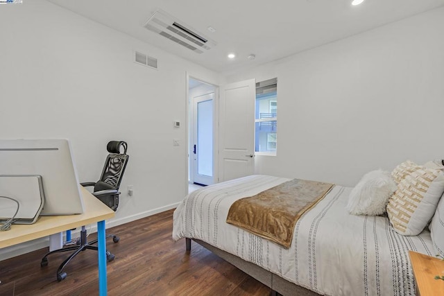 bedroom featuring dark wood-type flooring