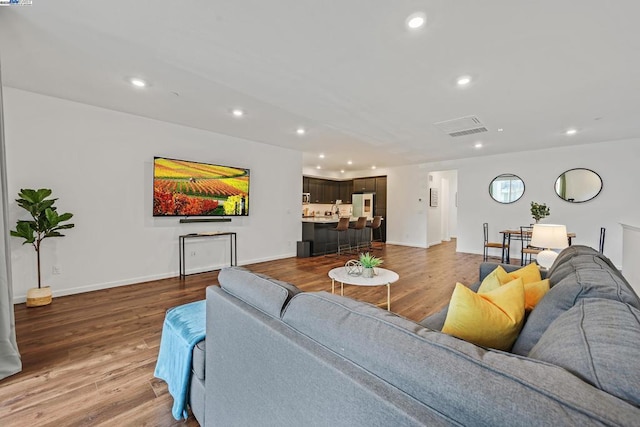 living room with wood-type flooring