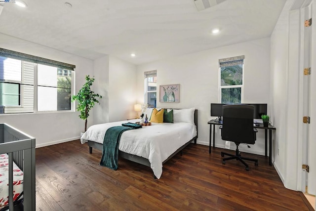 bedroom featuring dark hardwood / wood-style floors