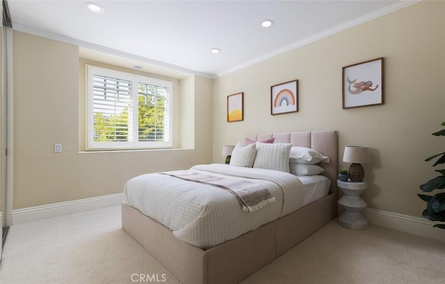 bedroom with light carpet and ornamental molding