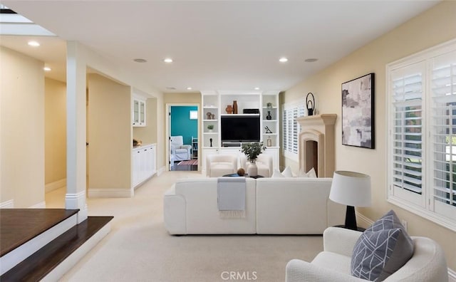 living room with light colored carpet