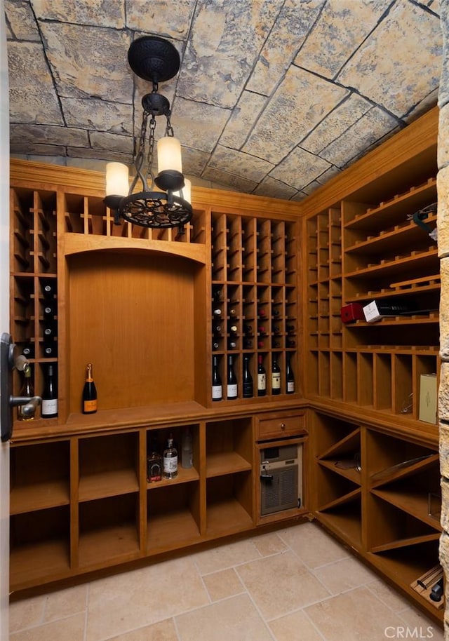 wine area featuring brick ceiling