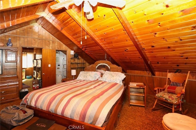 bedroom with dark carpet, vaulted ceiling with beams, wood ceiling, and wooden walls