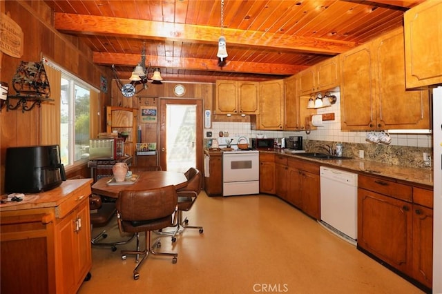 kitchen with wood ceiling, beamed ceiling, white appliances, hanging light fixtures, and sink