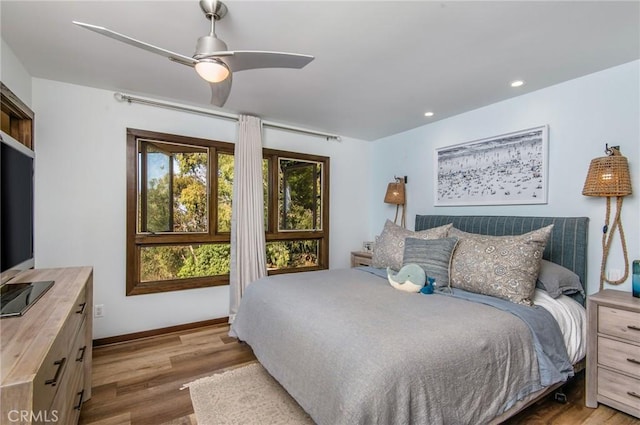 bedroom with recessed lighting, baseboards, ceiling fan, and light wood finished floors