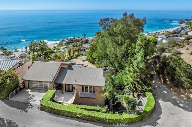 bird's eye view with a water view and a view of the beach