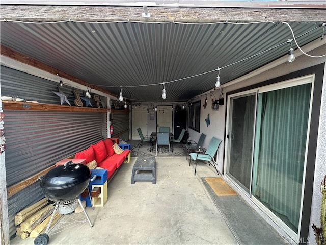 view of patio / terrace featuring an outdoor living space and grilling area