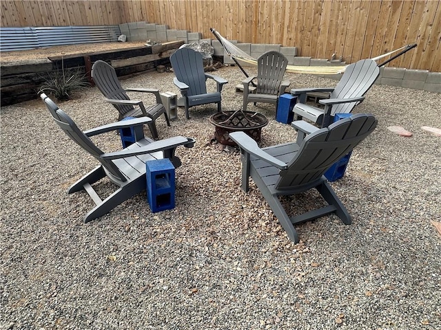 view of patio / terrace with an outdoor fire pit