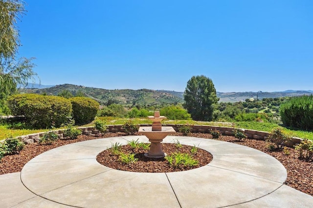 view of patio featuring a mountain view