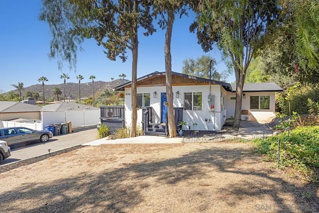 view of front of home featuring a mountain view