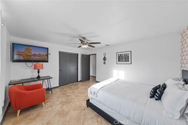 bedroom featuring ceiling fan and light tile patterned floors