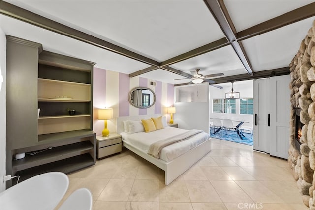 tiled bedroom featuring ceiling fan, beam ceiling, access to outside, and coffered ceiling