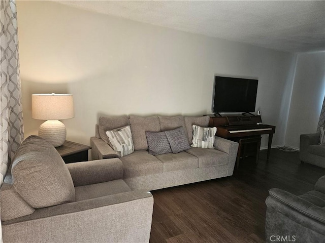 living room with dark wood-type flooring